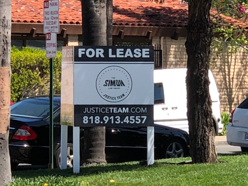 anti-graffiti commercial property “For Lease” sign