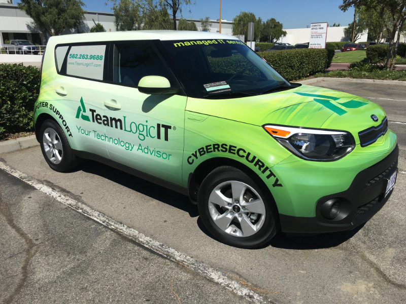 vehicle graphics and office lobby signs for franchisees in Orange County CA