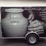 A Journey to Potters House, Inc spread their love by wrapping their trailer