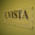 Acrylic lobby sign with standoffs