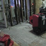 Air movers and dehumidifiers drying out the area