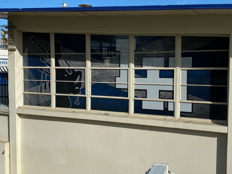 Perforated Window Graphics Allow Orange County CA School to Show Spirit