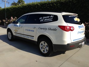 Courtes shuttle vehicle graphics for auto dealership in Raleigh NC