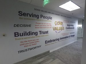 Company core values displayed in wall graphics