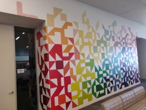 Installed wall mural with side wall wrap