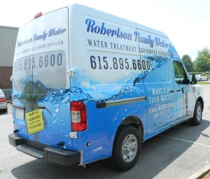 Custom water design for an advertising vehicle wrap by 12-Point SignWorks