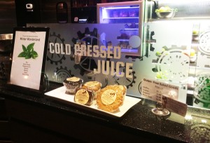 Here is one splash guard, advertising cold-pressed juices on the logo theme of the shop.
