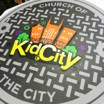The digitally printed manholes we created for COTC. 12-Point SignWorks