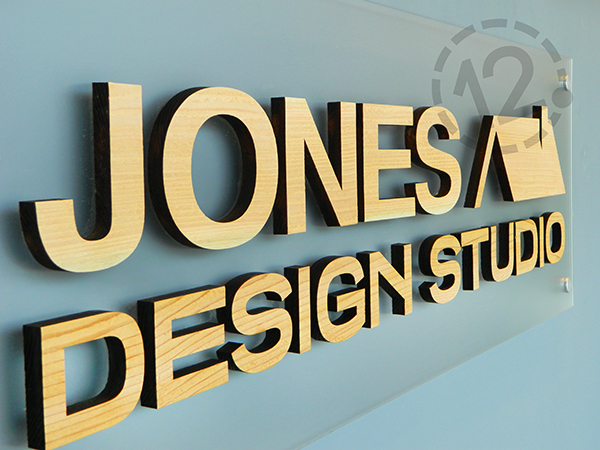 Frosted acrylic and wood dimensional sign for Jones Design Studio. 12-Point SignWorks - Franklin, TN