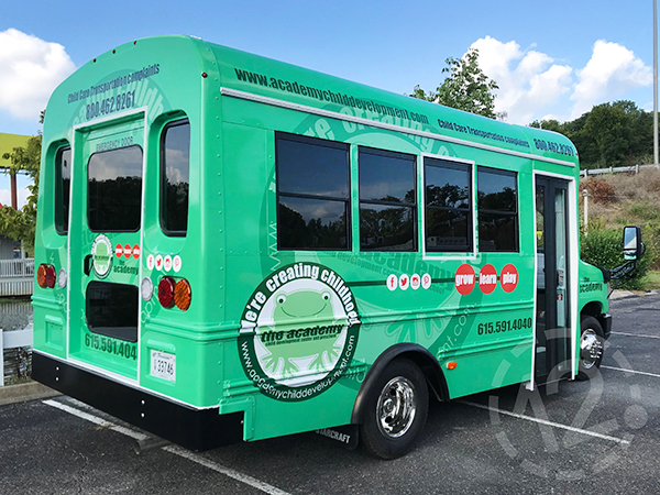 Custom bus wrap for The Academy Preschools by 12-Point SignWorks in Franklin, TN.