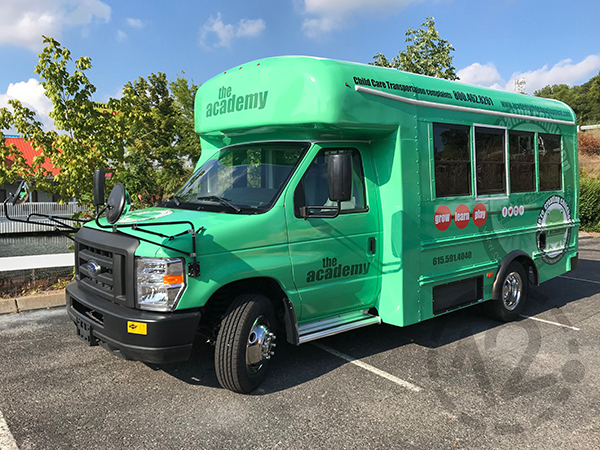 Custom bus wrap for The Academy Preschools in Franklin, TN by 12-Point SignWorks.