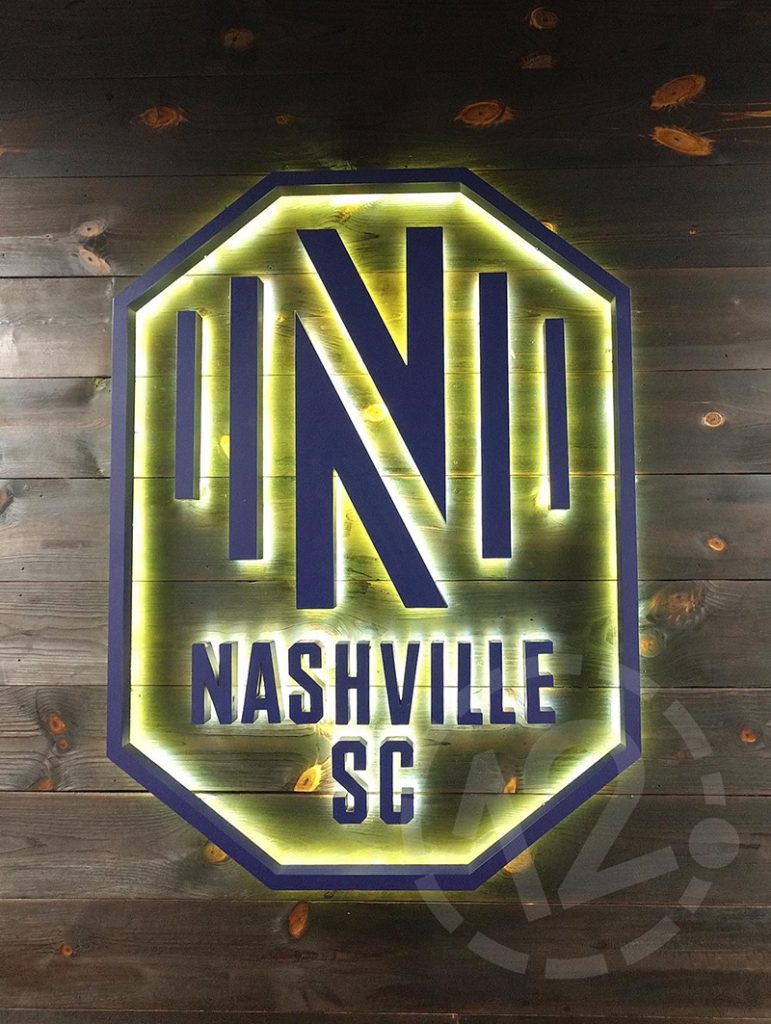 Custom halo lit logo sign for the Nashville Soccer Club by 12-Point SignWorks in Franklin, TN.