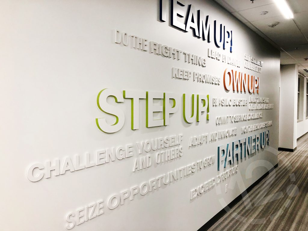 Dimensional word wall for SF Police Credit Union in San Bruno, CA fabricated and installed by 12-Point SignWorks.