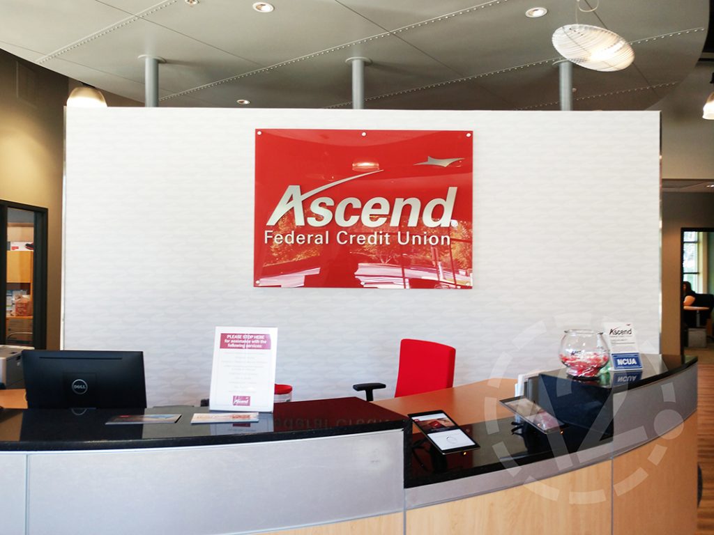 Custom wall vinyl and dimensional sign for Ascend Federal Credit Union by 12-Point SignWorks in Franklin, TN.