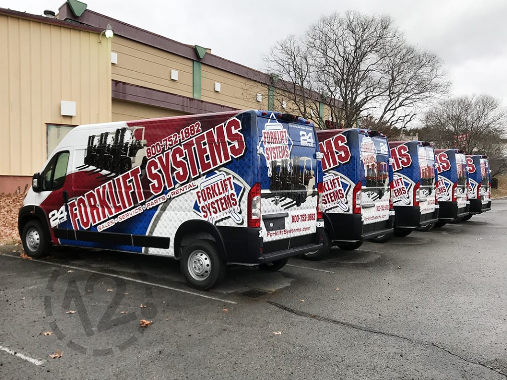 Custom fleet wraps for Forklift Systems in Nashville, TN by 12-Point SignWorks. 
