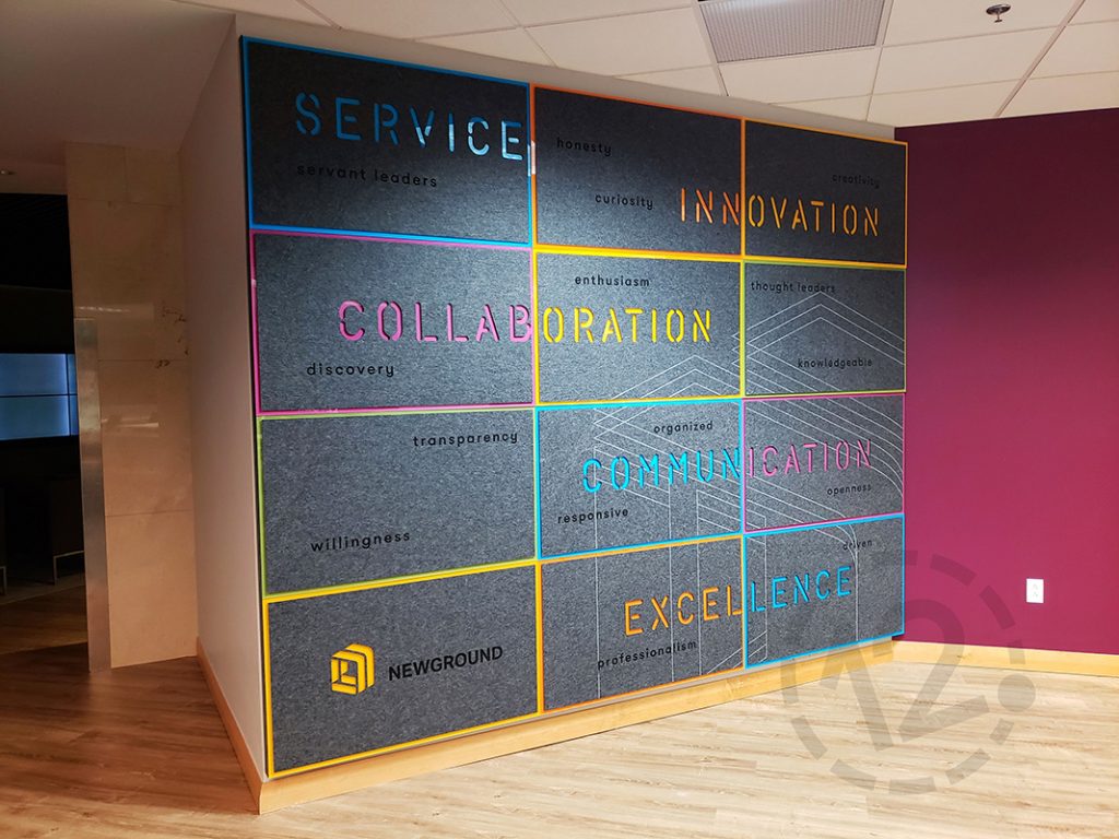 Custom Values Wall Display for NewGround in St. Louis, MO fabricated and installed by 12-Point SignWorks.