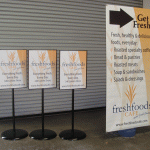 Banner stand and signs