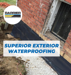 Brick home yard excavation for exterior waterproofing installation