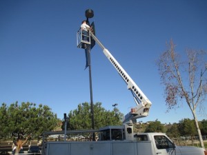 Bucket Truck putting up banners