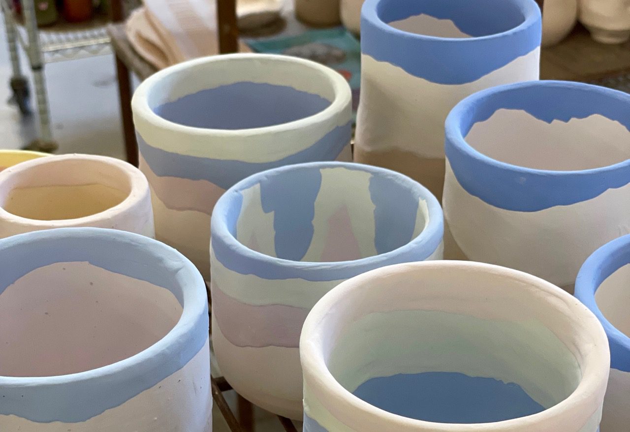 Glazed but unfired ceramic vessels