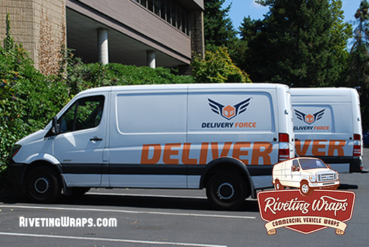 Multiple vans with the same fleet graphics.
