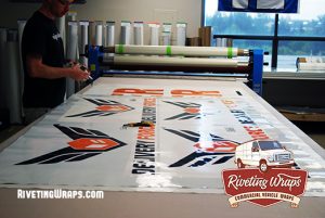 Van graphics on production table.