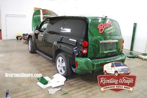 Catering Company Wrap Installation on Chevy HHR, in Progress