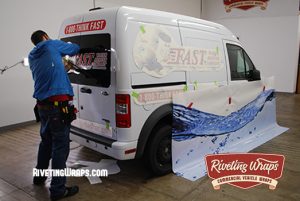 Transit Connect Home Service Wrap Installation. Bothell, WA. Riveting Wraps.