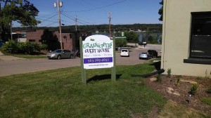 grasshoppers guest house sign