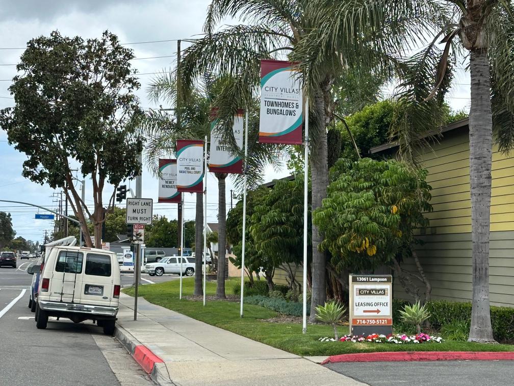 custom designed pole banners for apartment communities in ANaheim, ca