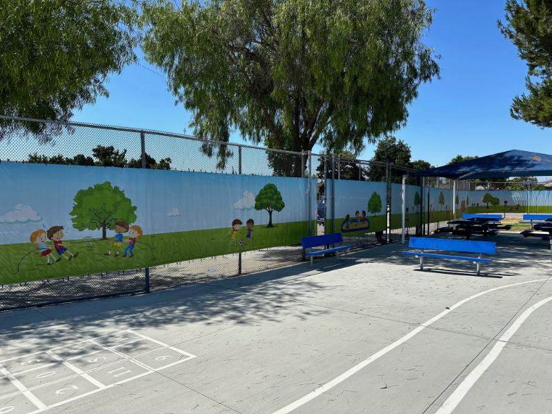 Custom mesh fence banners for elementary school playgrounds in los angeles county