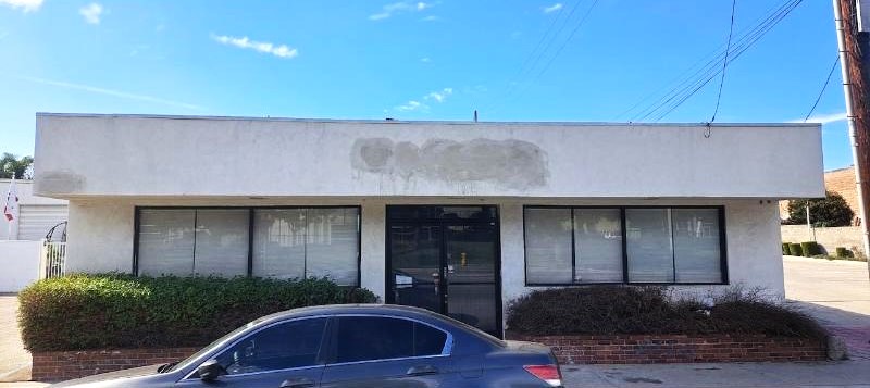 stucco repair after building sign removal in paramount, ca