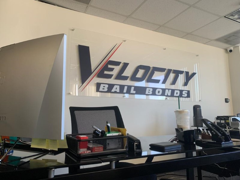 clear acrylic logo wall signs with brushed aluminum wall standoffs in orange county, ca