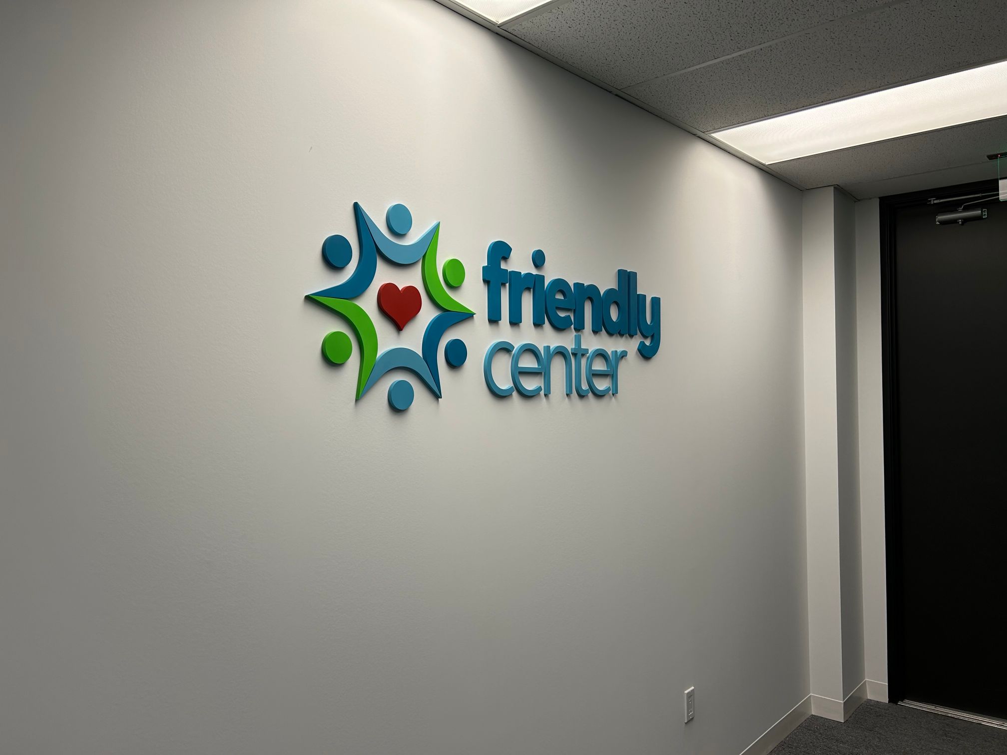 Custom Reception Logo Wall Sign for Friendly Center in Orange California