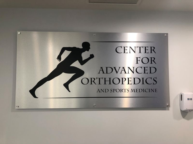 brushed aluminum lobby logo signs