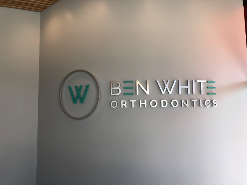 Custom Made Brushed Metal Lobby Logo