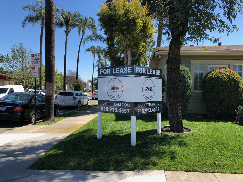 anti-graffiti commercial property “For Lease” sign