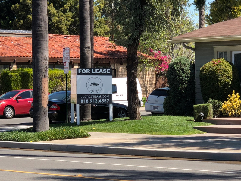 anti-graffiti commercial property “For Lease” sign