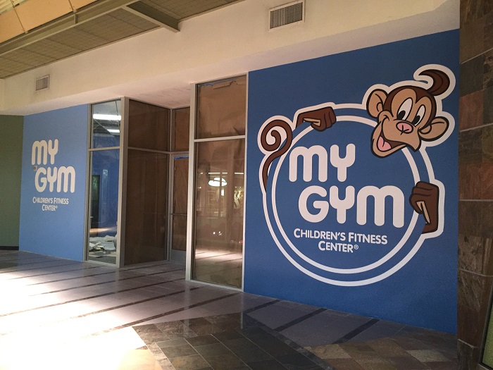Storefront signs for mall tenants in Orange County CA