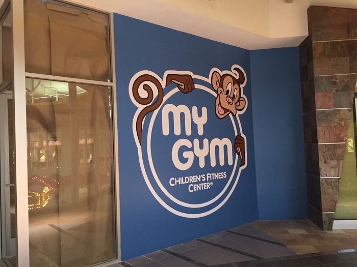 Storefront wall murals for mall tenants in Orange County CA