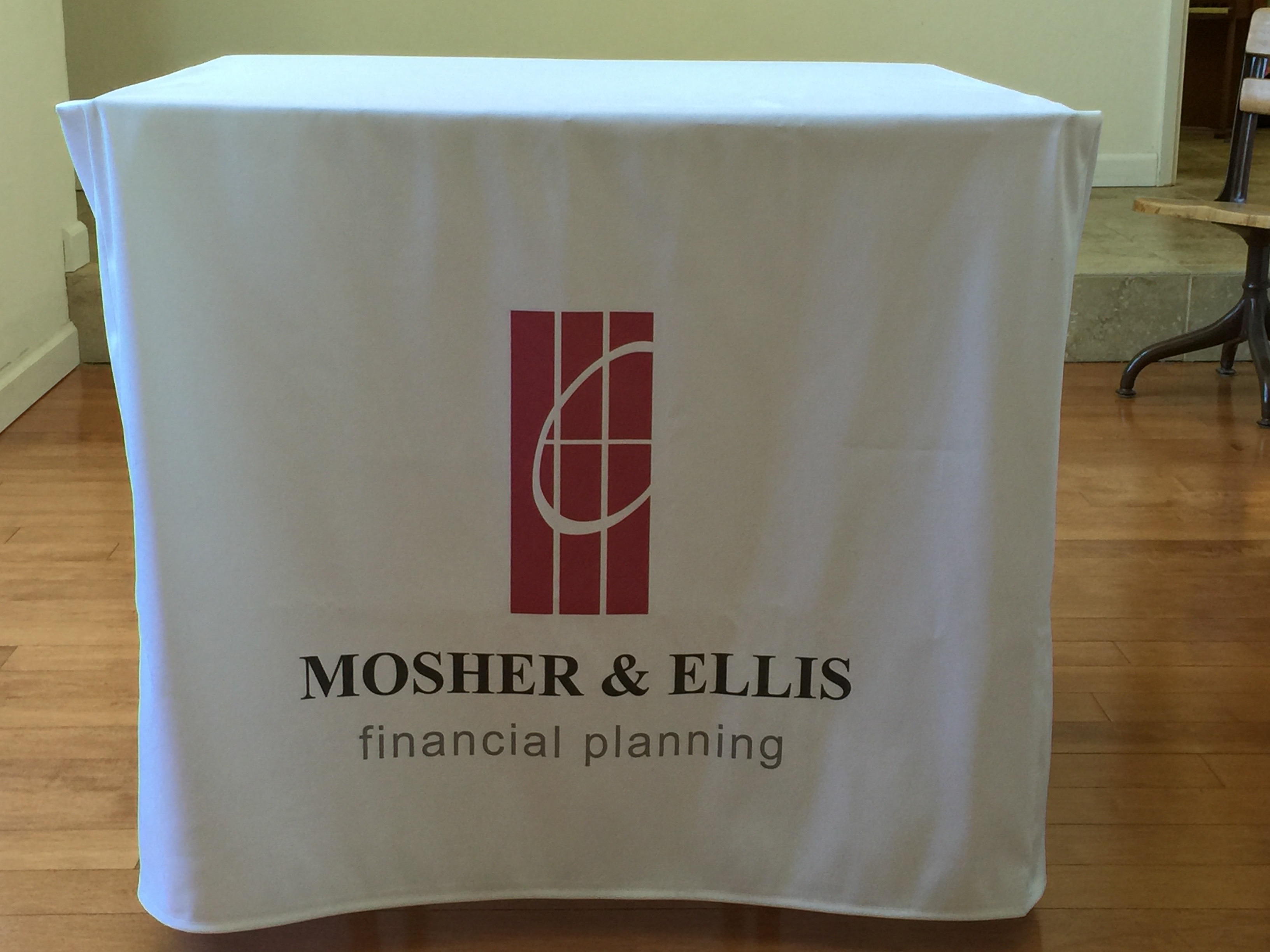 Front of table with logo