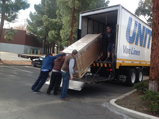 The Big Day the truck arrived. . . . It took everyone to get it out of the truck and into the office . . 