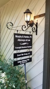 Installed projecting sign