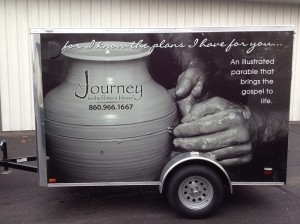 A Journey to Potters House, Inc spread their love by wrapping their trailer