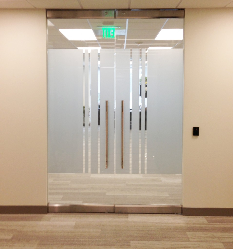 Finished Privacy Frosting on Accudyne Industries Entrance Doors by Dallas Digital Signs & Graphics Dallas
