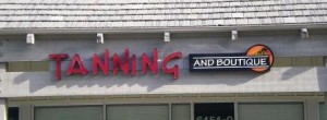 Channel letters mounted to a raceway with a logo box.