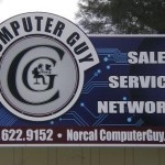 Wall signs denote where the business is located and what they have to offer.