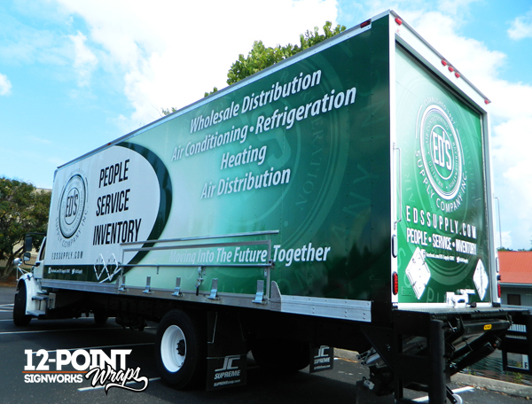 The new design for Ed's Supply Company on one of their 28' box trucks. Notice the striking green color?