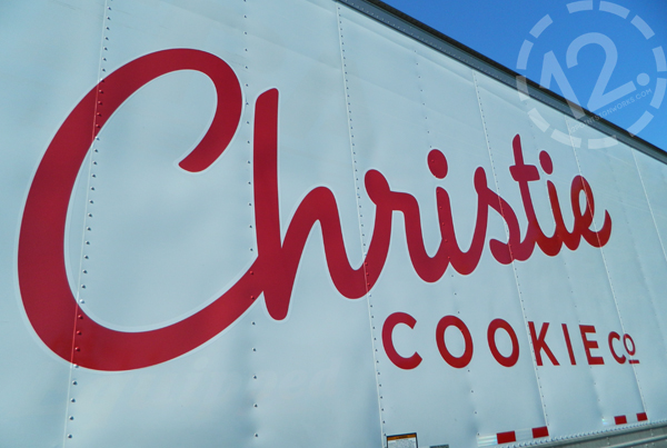 The cut vinyl with The Christie Cookie Co. name on the side of a semi trailer. 12-Point SignWorks