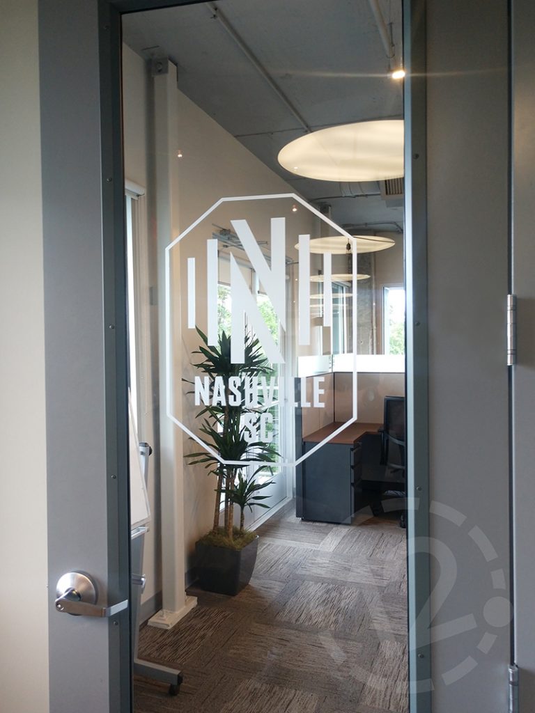 Etched vinyl logo for the Nashville Soccer Club by 12-Point SignWorks in Franklin, TN.